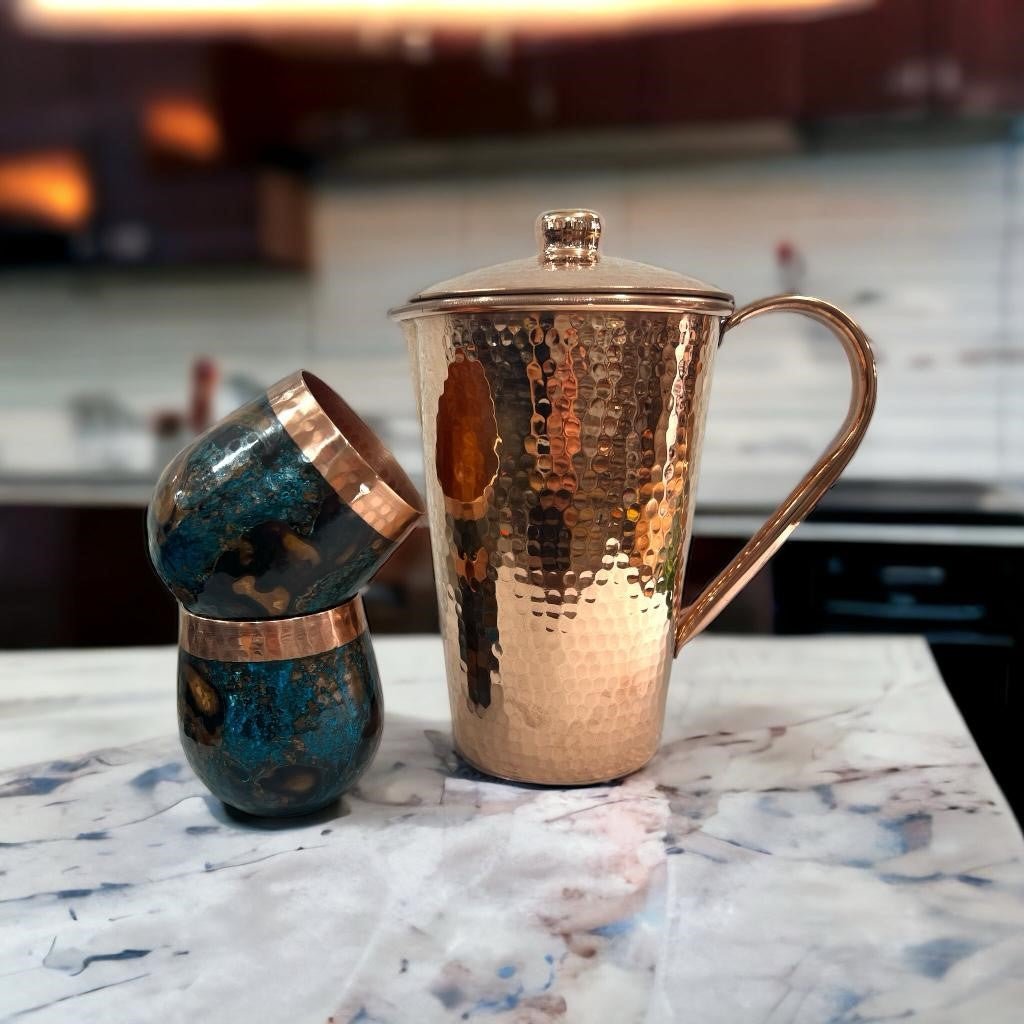 Set of One Shiny Hammered Copper Pitcher with Top and Two Blue Marbled Tumblers - Marsh and Manor Collective